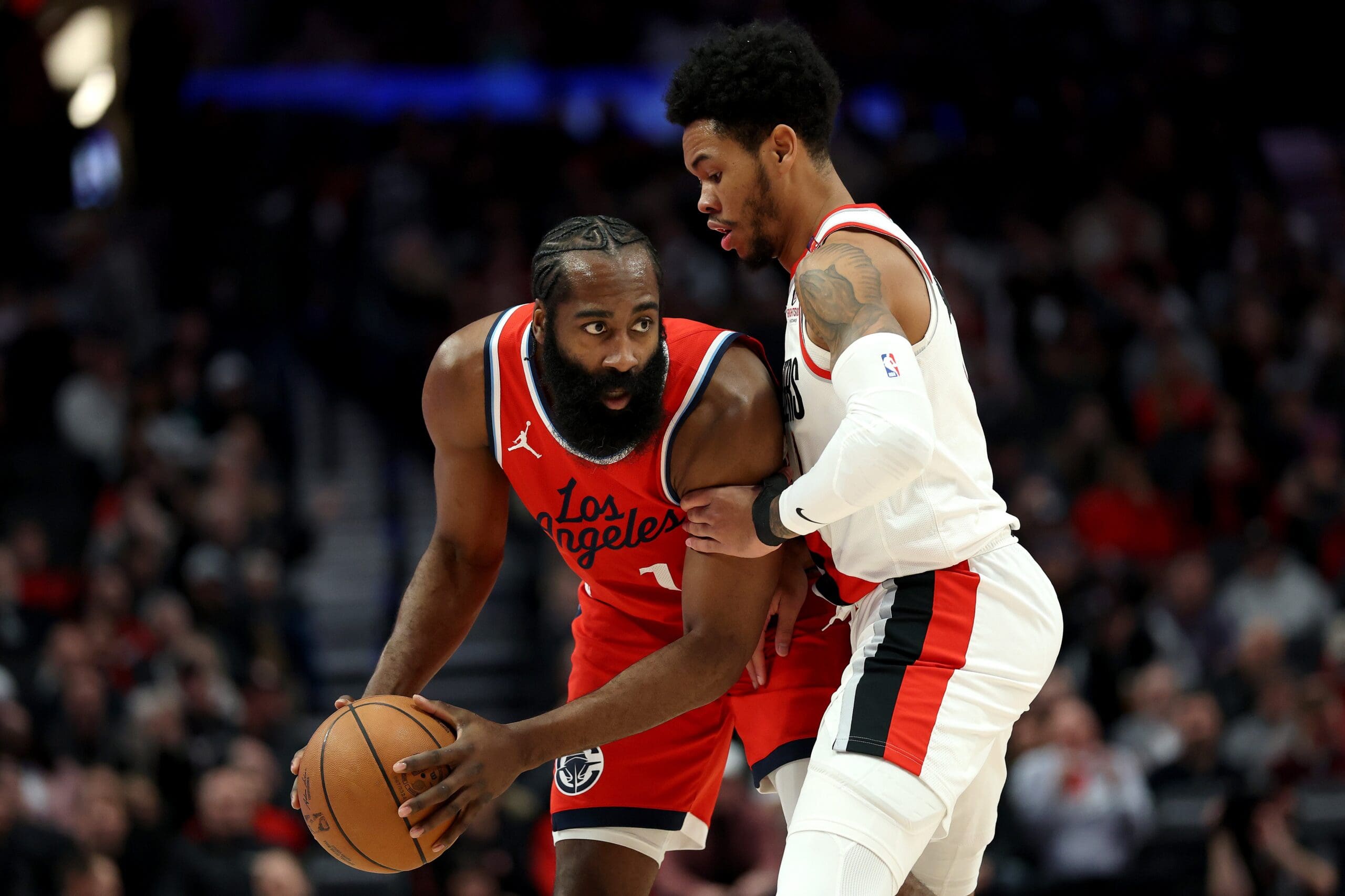 Anfernee Simons #1 of the Portland Trail Blazers defends James Harden #1 of the LA Clippers during the first half at Moda Center on January 16, 2025 in Portland, Oregon. 