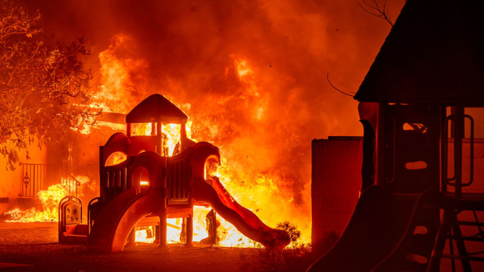 A playground burns in a residential neighborhood during the Eaton fire in Pasadena, California on January 7, 2025.