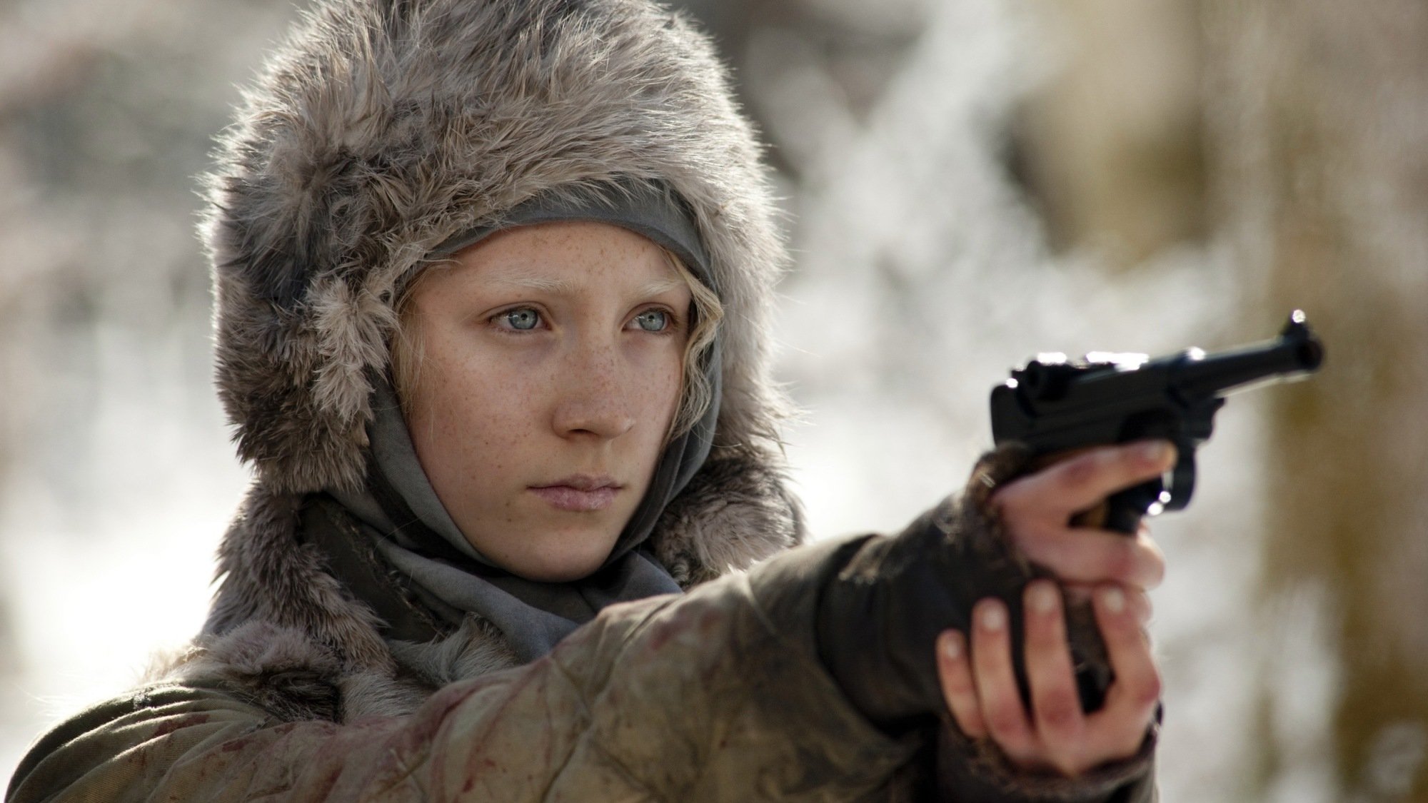 Saoirse Ronan aims a gun in "Hanna."