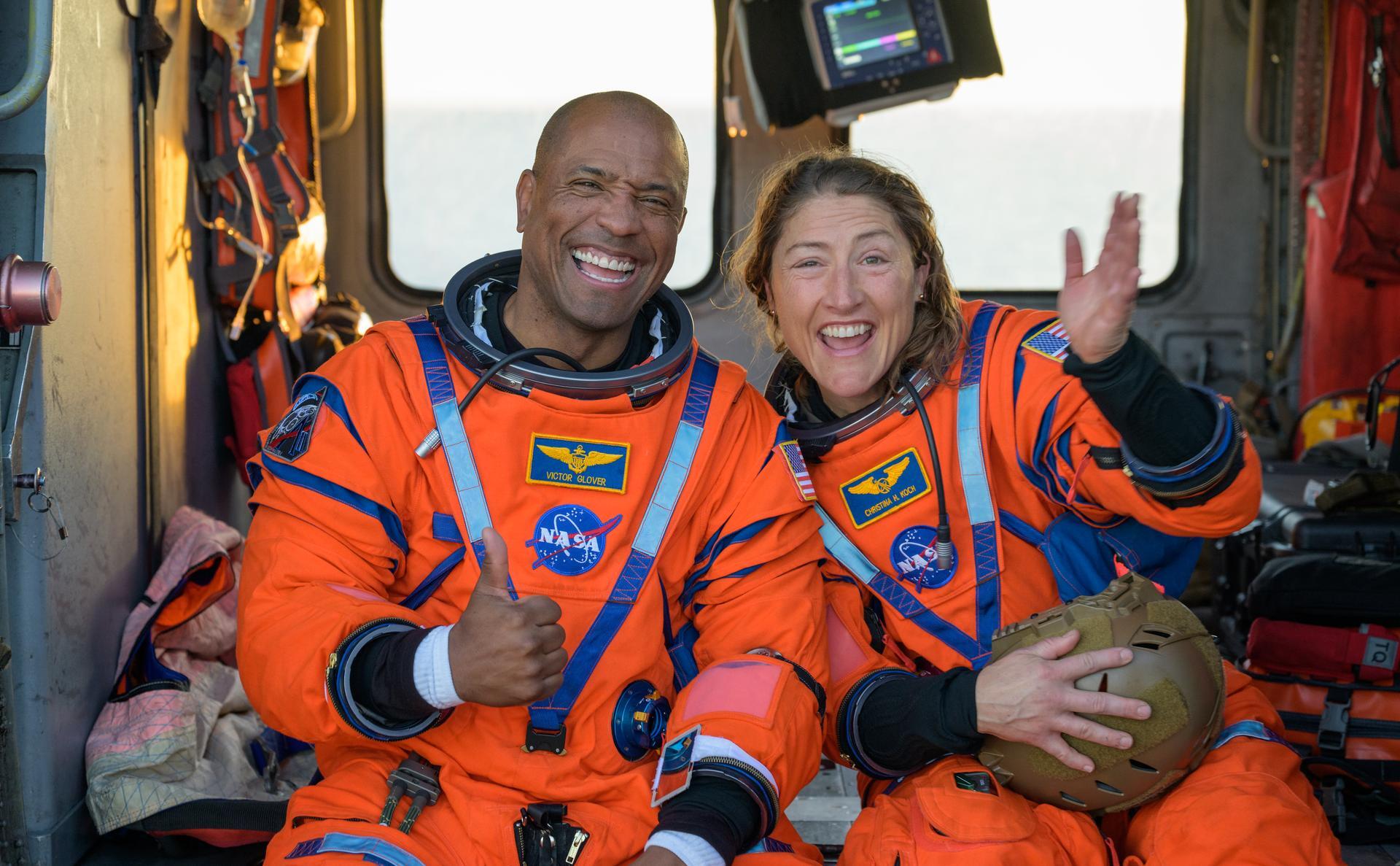 Artemis II astronauts Victor Glover and Christina Kock beaming after their splashdown