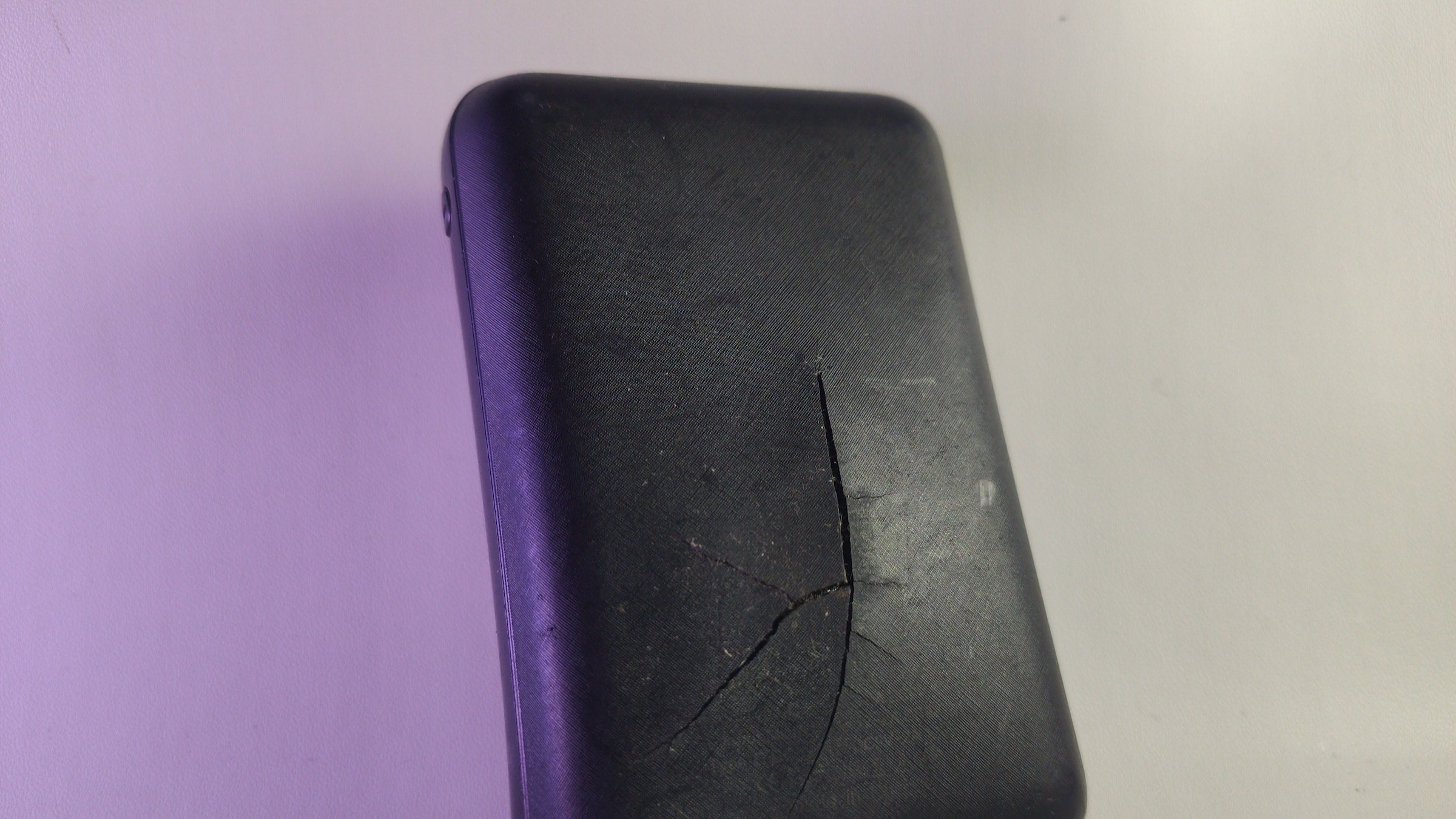 A generic power bank with a swollen battery.