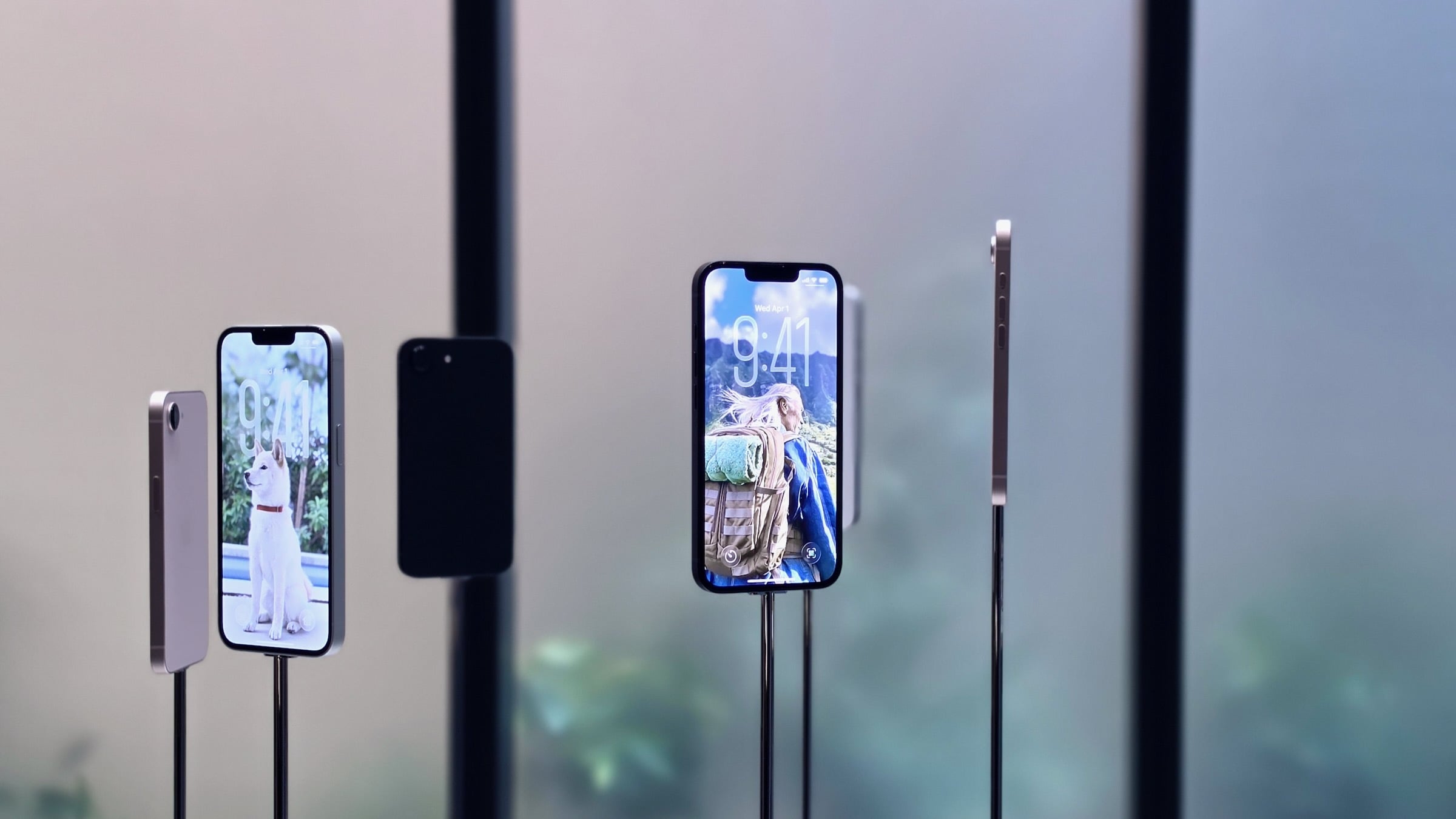 row of iphone 17 smartphones on display