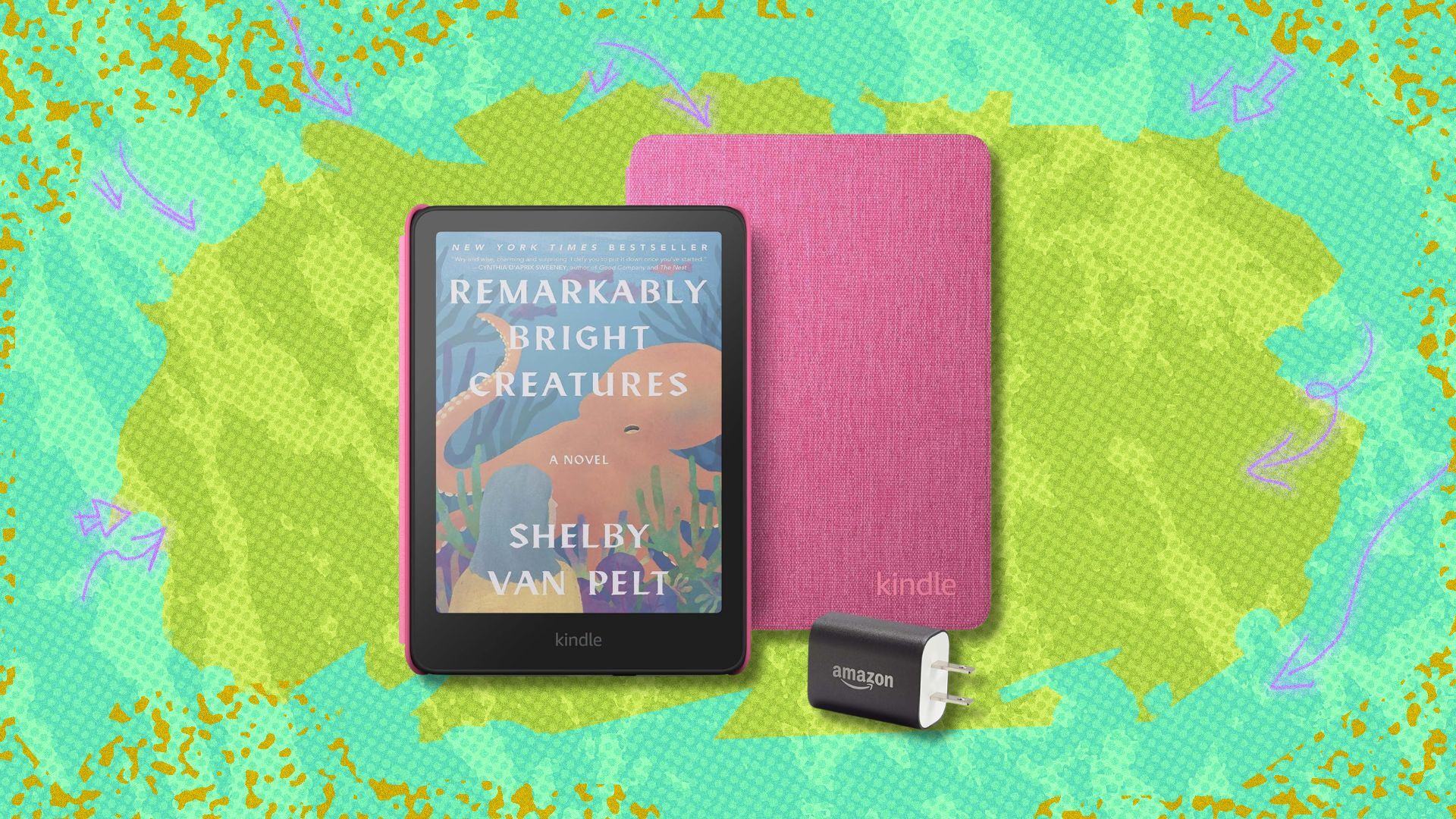 kindle colorsoft, fabric cover, and power adapter against a green patterned background