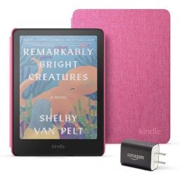 kindle colorsoft, fabric cover, and power adapter against a white background