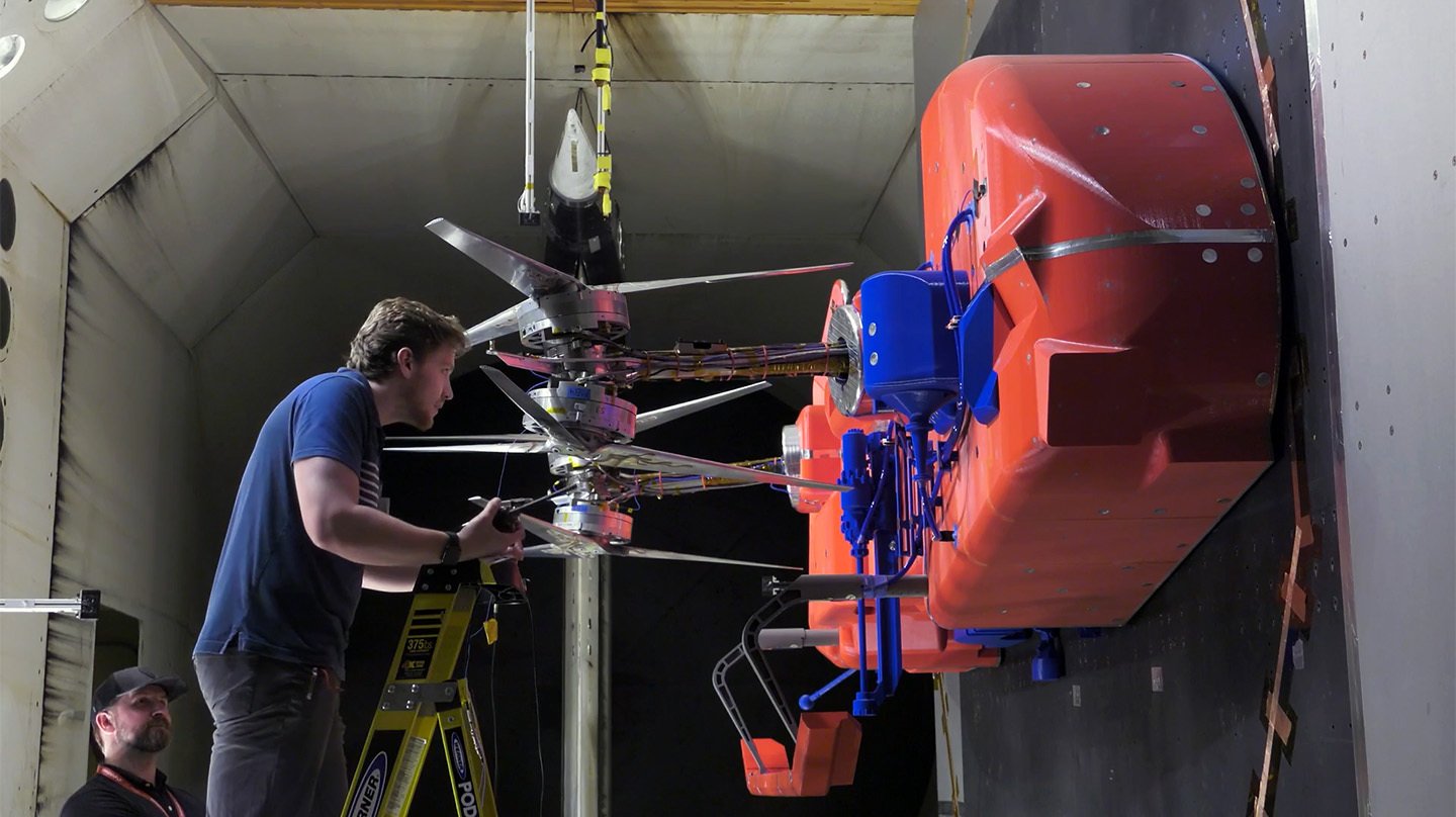 Engineers installing rotors on Dragonfly model