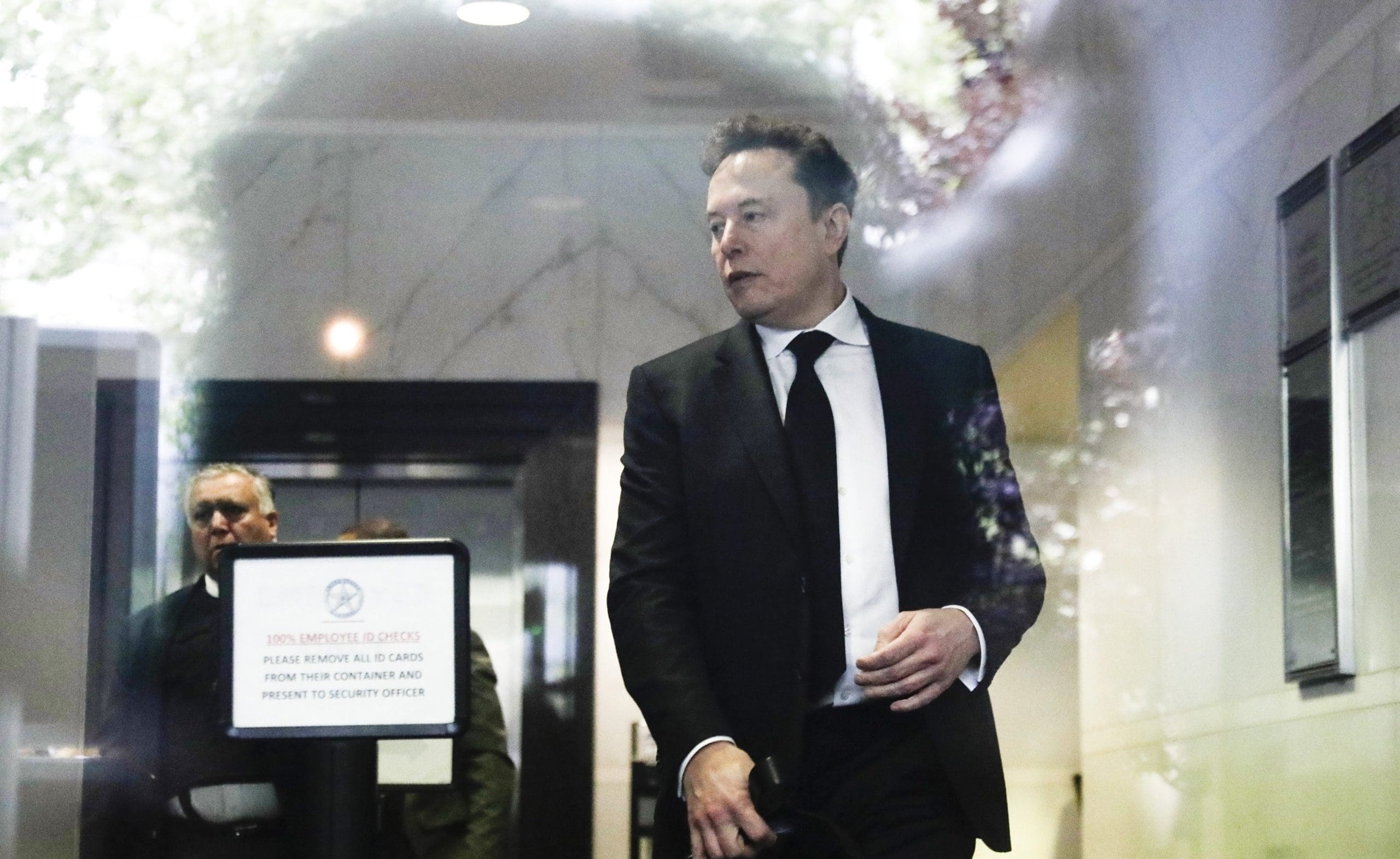 Elon Musk going through courthouse security